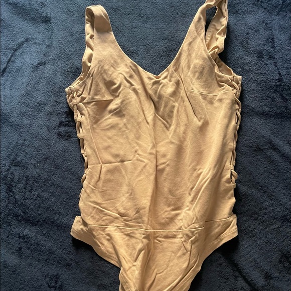 Premium quality bodysuit with classy cut out design on side - Picture 1 of 5